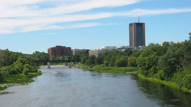 {{GFDL}} Carleton University in Ottawa, Ontario, Canada; August 2004; seen from the Bronson St. Bridge over the Rideau River