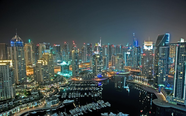 Dubai via https://pixabay.com/en/dubai-skyscrapers-high-rises-256585/