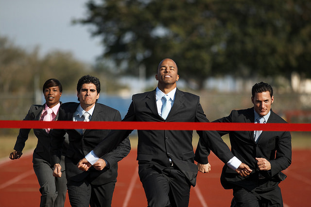 Business Executives Running a Race by Corbis