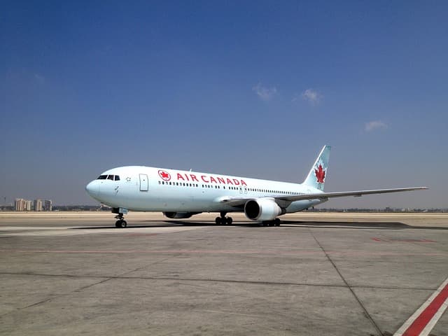 Air Canada plane via https://pixabay.com/photos/air-port-airplan-israel-bgn-996517/