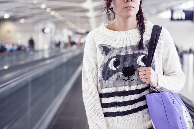 Woman at Airport via https://pixabay.com/en/woman-airport-girl-travel-female-594465/
