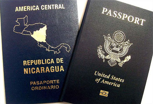Two passports representing dual citizenship by https://www.flickr.com/photos/lanicoya_/ https://creativecommons.org/licenses/by/2.0/deed.en