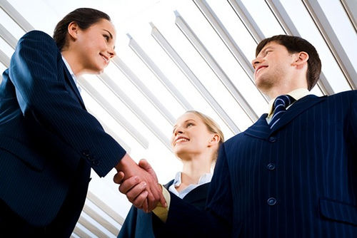 Business people shaking hands