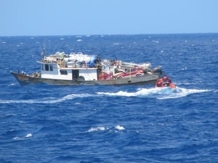 USCG Rescuing Haitian Refugees via https://commons.wikimedia.org/wiki/File:USCG_sailors_rescuing_Haitian_refugees_-b.jpg?uselang=en-gb