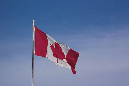 Canadian Flag By Kim Newberg [Public domain], via Wikimedia Commons