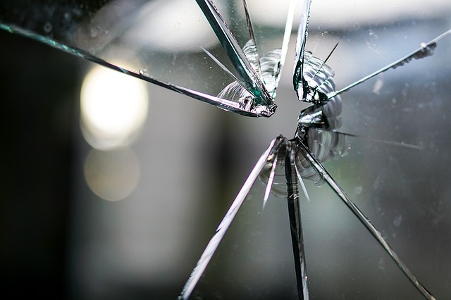 Broken Glass via https://pixabay.com/en/glass-broken-fragmented-hole-crack-1497227/